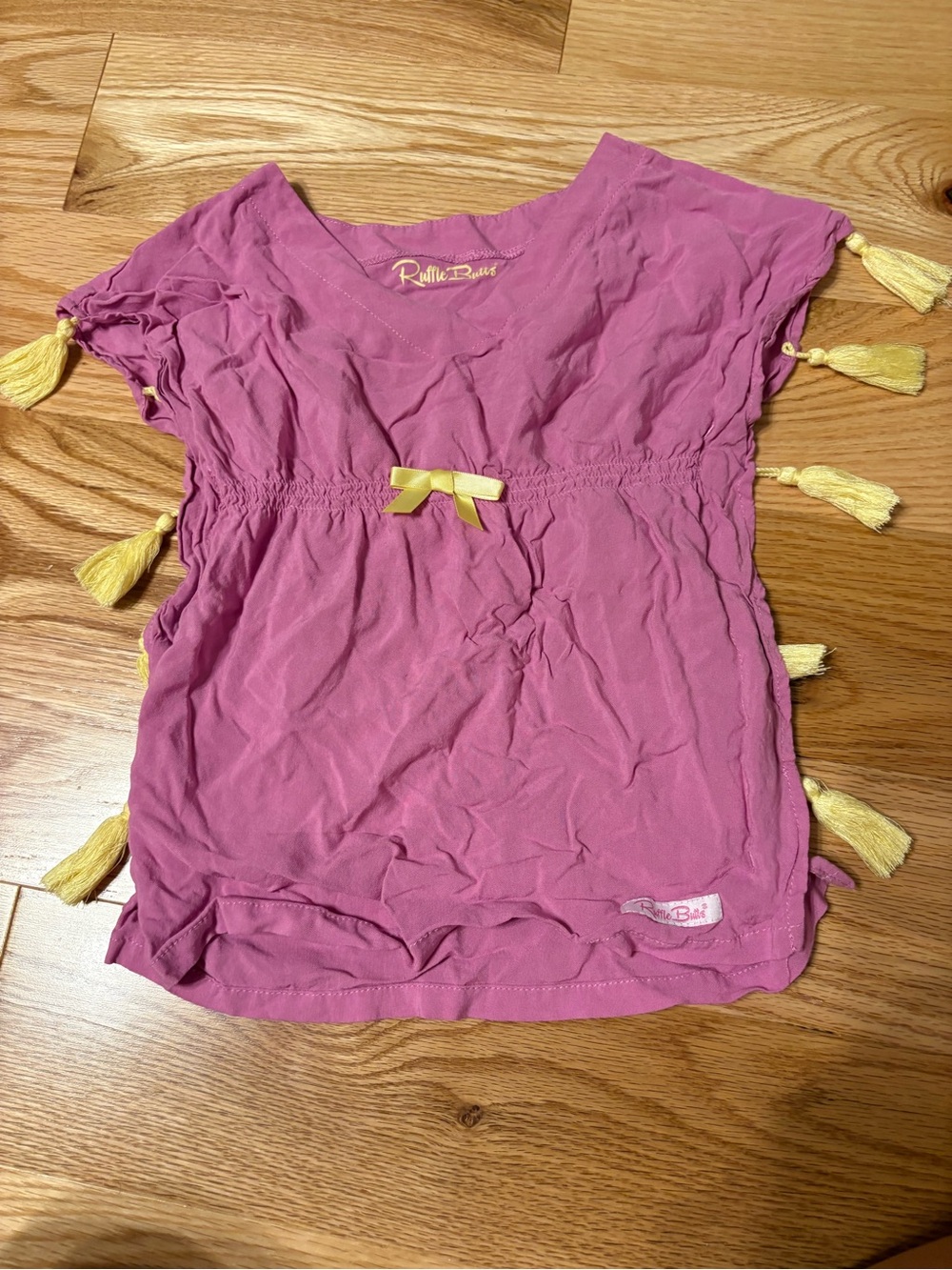 Ruffle Butts Pink Tee with Yellow Tassels